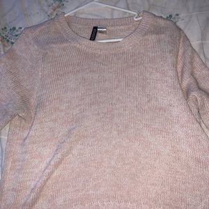 Pink knitted sweater